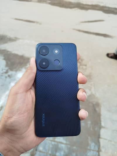 Infinix smart 7 all okay  4.64with charger 03136924371