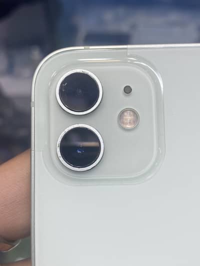 I phone 12 64gb 83 health all oky no open no repair