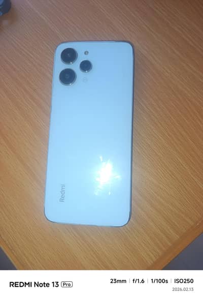 Redmi 12 (8/128)box ,blue   Glass back for sale wotsapp O33252O1289