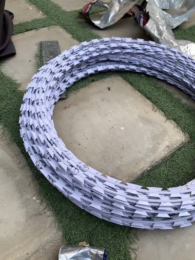 Razor wire and barbed wire