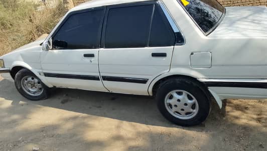 Toyota Corolla 1986 model 1992 ka kota hy
