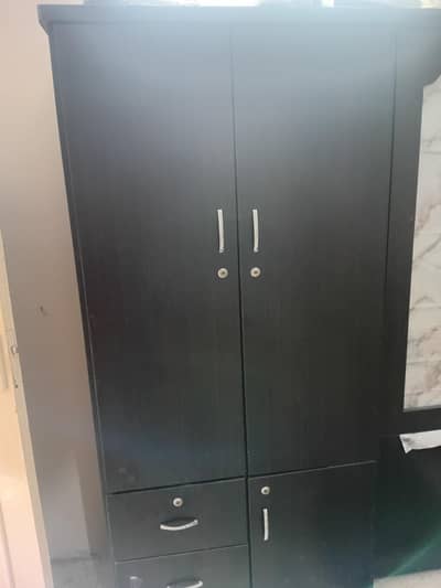 i am urgently selling my cupboard two door very good new condition