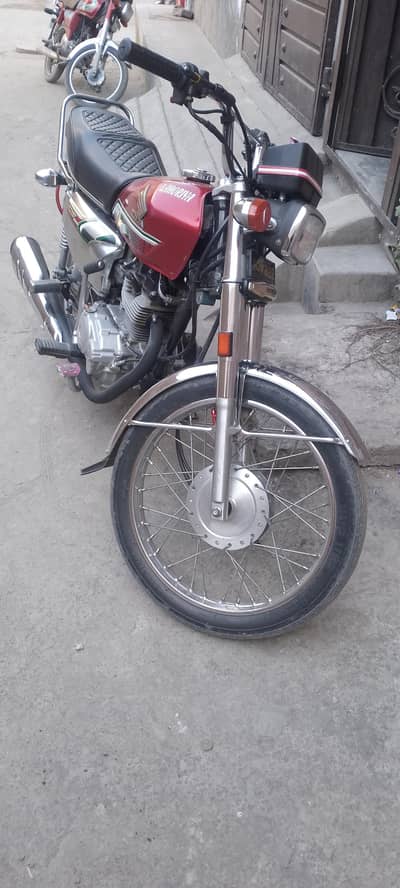 Honda 125 self start with Golden nomber. 03067803390