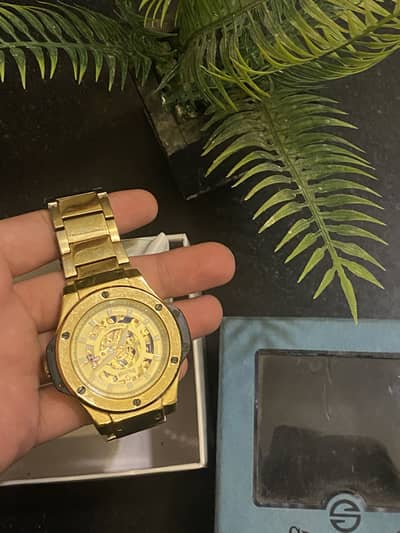 Sveston mens watch Golden colour infinity dial