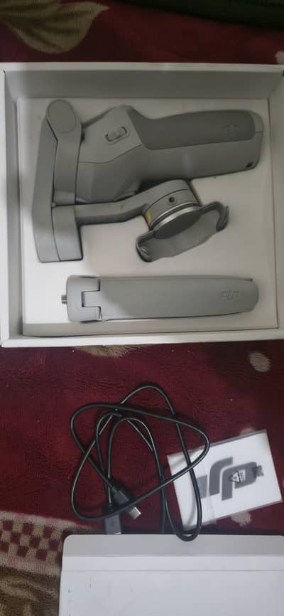 DJI Osmo Mobile SE Gimbal – Like New | Box Available