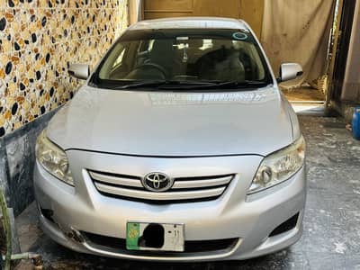 corrola Gli 2011 geniun total