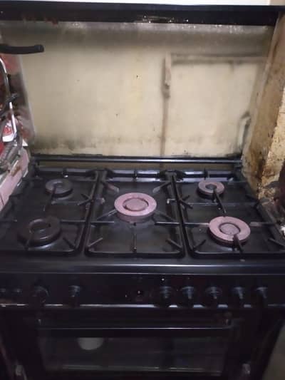 Stove with 5 burners and baking oven