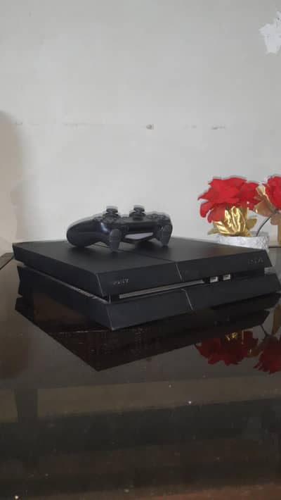 Playstation 4 fat version + 6 games