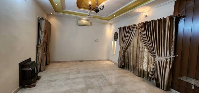 1 kanal commercial building available for office Wapda town Main boulevard 8 rooms attached bath Double kitchen 1 drawing room 2 dining room 2 big halls Tile flooring Beautiful ceiling 27 kva generator backup  Air conditioners 1 geyser  3 servant quarters Huge parking space 6.5 lac demand