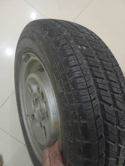 R12 General New tire & rim