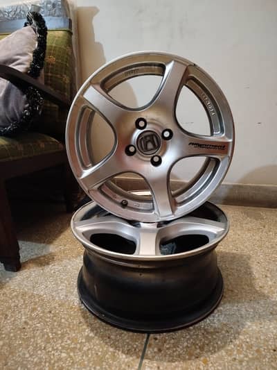 Alloy wheels 15 inches 6.5JJ pcd 100 4 nuts(only rims)