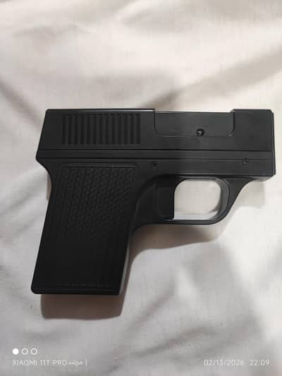 gun lighter with 10 cigrrate storage. . . . helmet lighter. . .