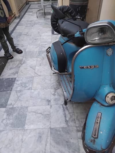 Scooter in blue colour