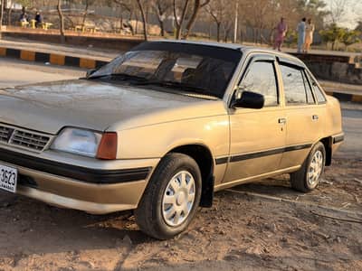 Daewoo racer for sale in Islamabad  like new car  original Rim