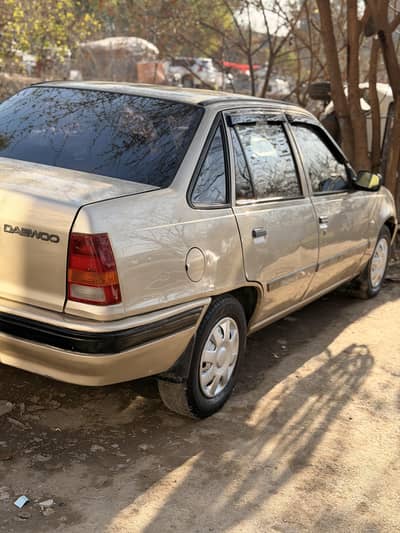 Daewoo racer for sale in Islamabad  like new car  original Rim