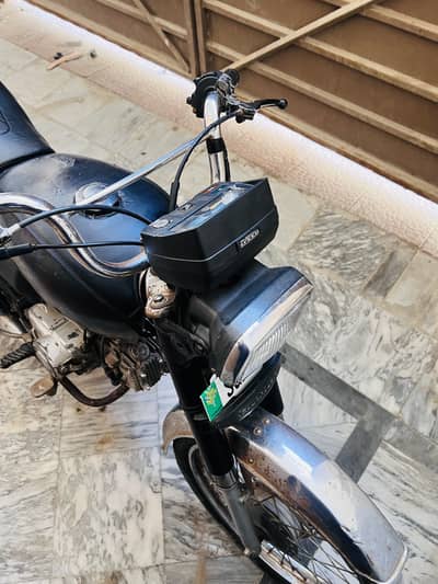 Honda CD 70 2014 with helmet