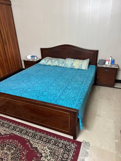 Bed with side tables