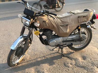 unique 125 all over okay h , bike me koi kam nh h