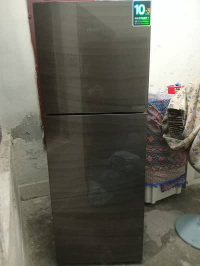 Haier medium sized fridge 10/10 condition . Negotiate price urgently s