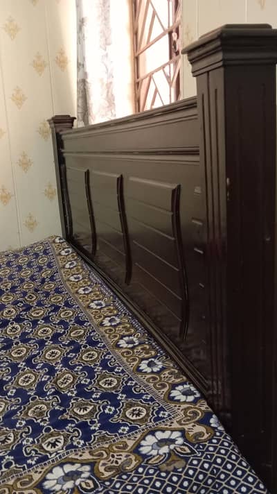 Elegant Dark Wooden King Size Bed with Modern Design