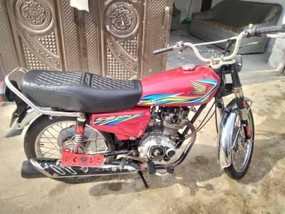 Honda 125 with double saaman