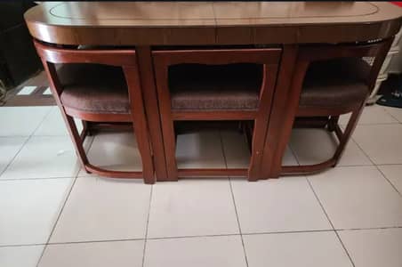 Wooden dining table with 6 chairs