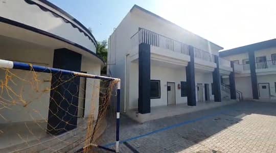 Reserve A Centrally Located Building In Officers Colony