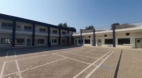 Reserve A Centrally Located Building In Officers Colony