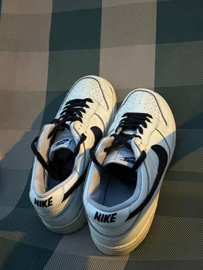 Nike dunk low “reverse panda”