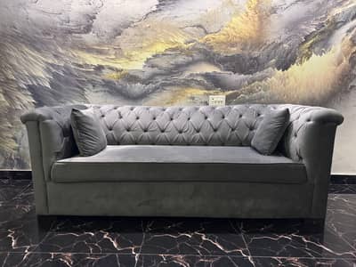 Selling this elegant, premium-quality grey velvet sofa in excellent c