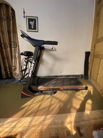 Foldable electric treadmill with massage belt