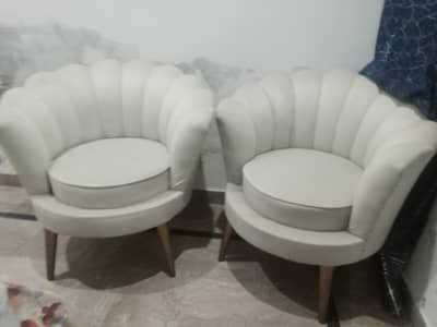 king size bed with two sofa with two side table with one dressing