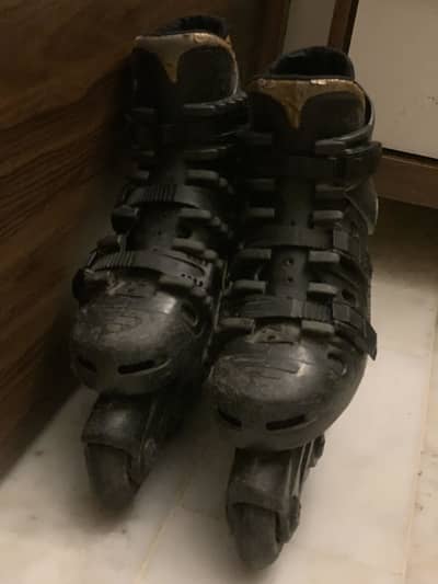 Black Roller Blades  + Green Helmet for Sale