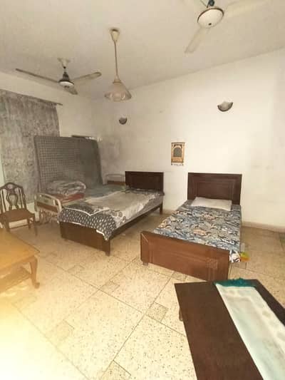 Spacious 10 Marla Double Storey House For Sale On 60 Feet Road In Faisal Town Lahore