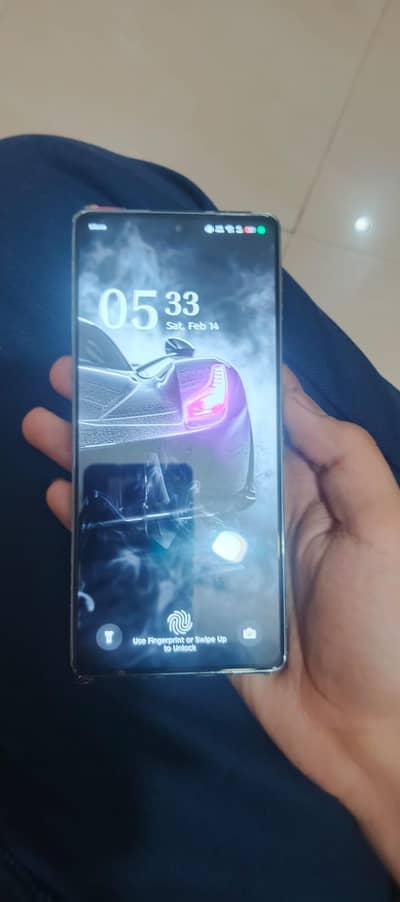 infinix note 40 with 2 free case and a back sticker Wallpaper