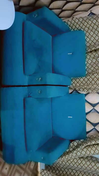 Sofa set in teal green color