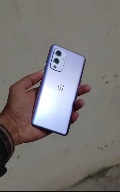 one plus 9 5g 8/128 signal sim.