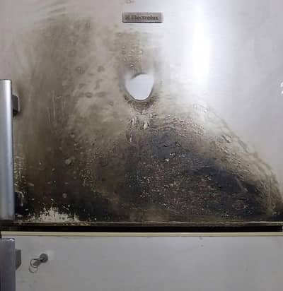 damaged fridge
