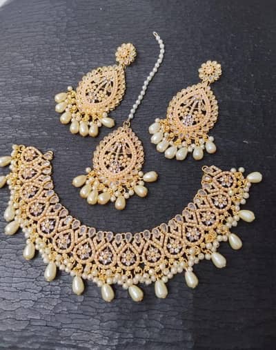 Necklace. with earrings. .