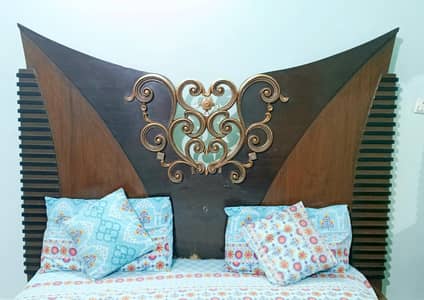 Double bed with dressing table and spring mattress