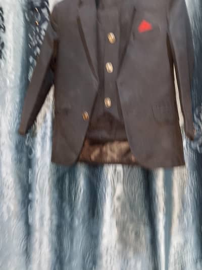 Black three piece pent coat