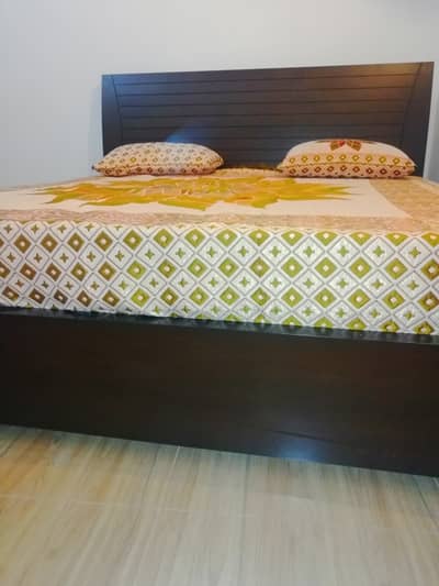 KING SIZE Bed, two side tables, dresser with mirror for sale.