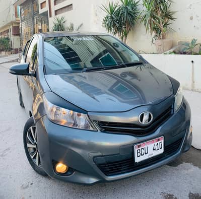 Toyota vitz 2011 model 2014 registration