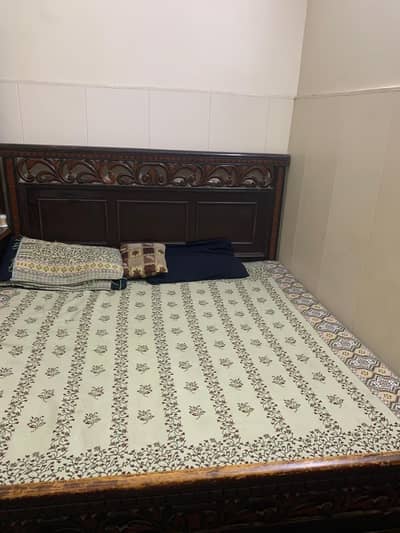 double bed with dressing table and 2 side tables