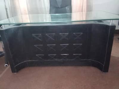 Table with heavy glass on top