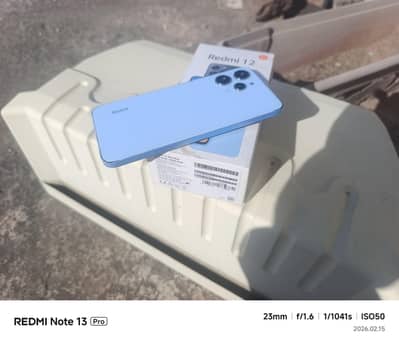 Redmi 12 (8/128)box ,blue   Glass back for sale wotsapp O33252O1289