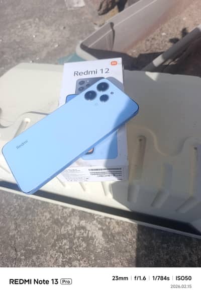 Redmi 12 (8/128) ,1st owner, Glass back for sale wotsapp O33252O1289