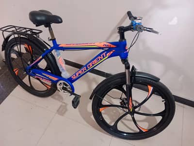 26" Sized Cycle with disc brakes and shocks. 1 month used. 03114624317