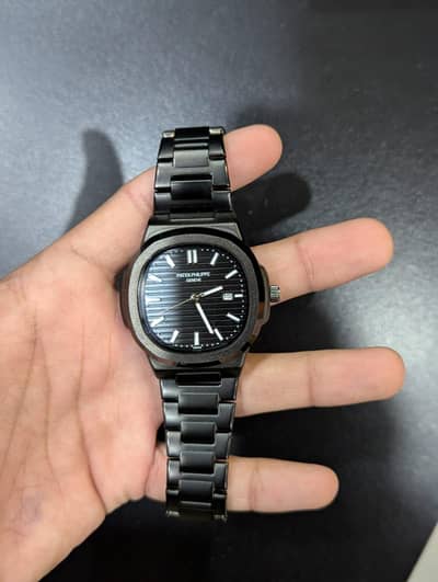 Pattek Phillips matt black watch swiss made with glosy black dial"!