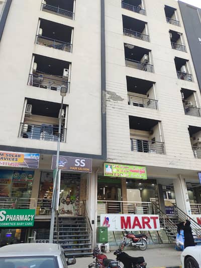 faisal town ground floor shop for sale main markaz